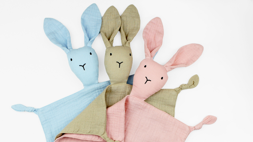 Toy rabbit baby comforters made from soft cotton muslin in blue, beige and pink